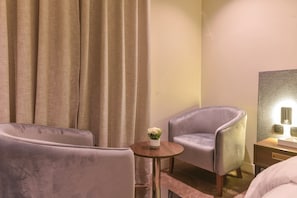 In-room safe, desk, laptop workspace, iron/ironing board