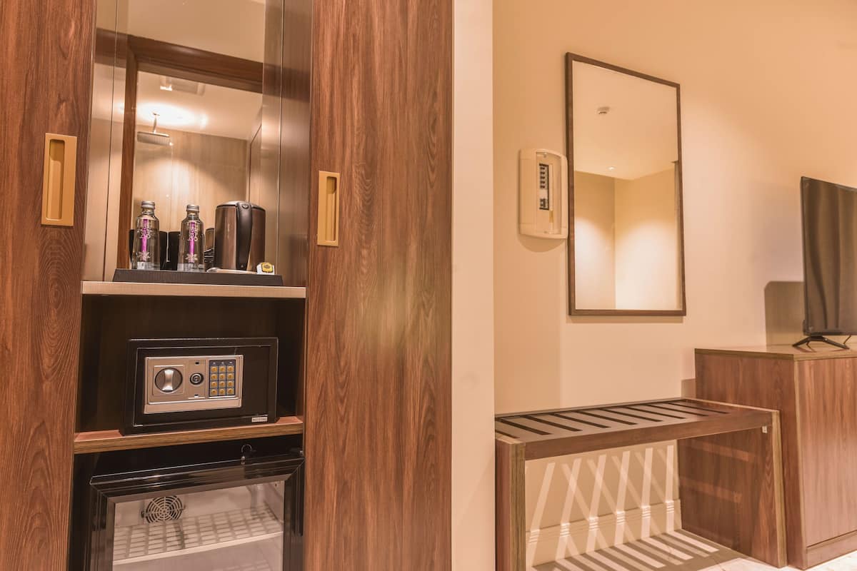 In-room safe, desk, laptop workspace, iron/ironing board