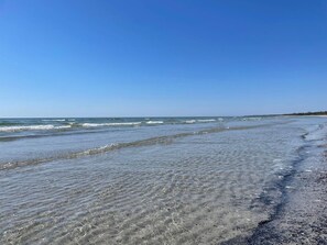 A beach with clear water and a visible shoreline. - 4 Star Holiday Home in Hollviken (Hollviken)