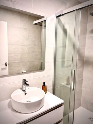 Hair dryer, towels, soap, toilet paper