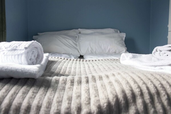 2 bedrooms, travel crib, WiFi, bed sheets