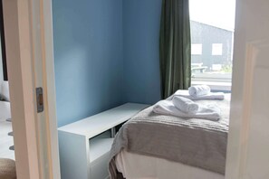 2 bedrooms, travel crib, WiFi, bed sheets