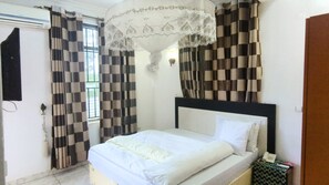 Double Room, Balcony, City View | Iron/ironing board, free WiFi