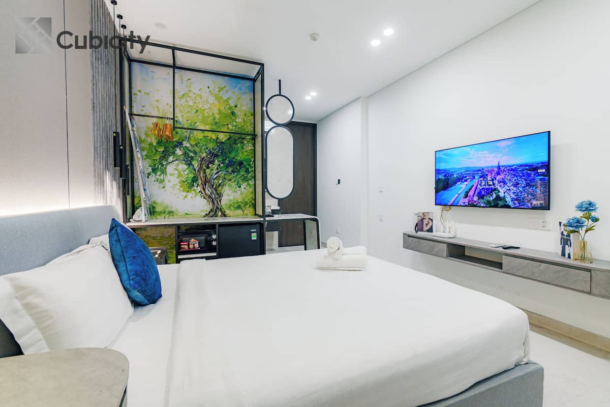 Down duvets, memory-foam beds, desk, laptop workspace