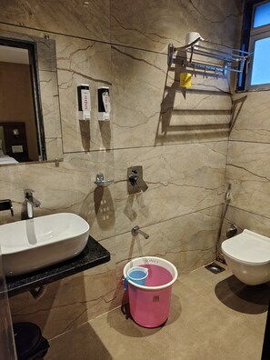 Shower, free toiletries, slippers, towels