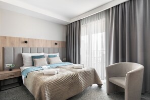 Comfort tweepersoonskamer | Een bureau, gratis wifi, beddengoed