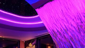 Indoor pool, open noon to 8:00 PM, pool loungers, lifeguards on site