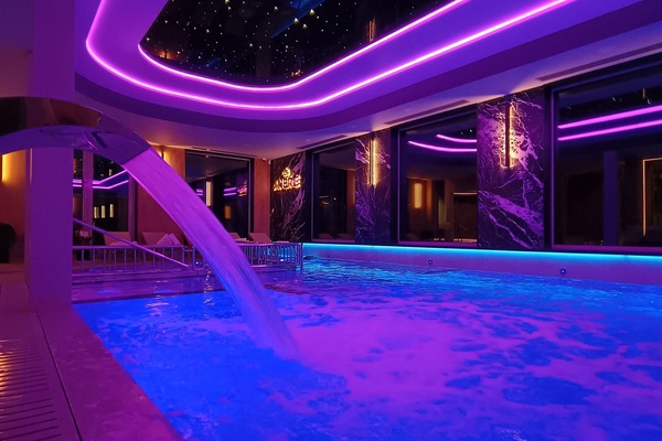 Indoor pool, open noon to 8:00 PM, sun loungers, lifeguards on site