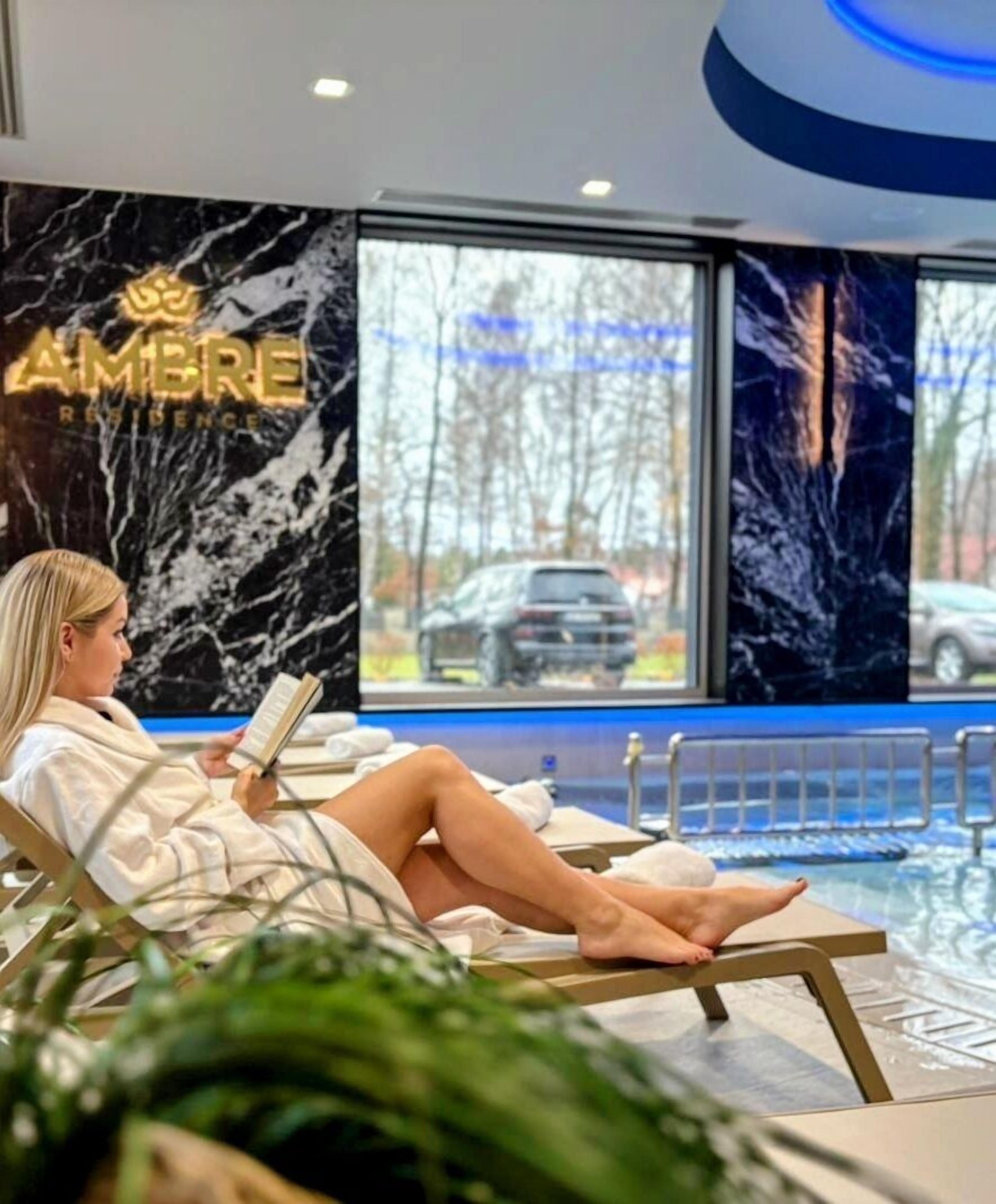 Indoor pool, open noon to 8:00 PM, pool loungers, lifeguards on site