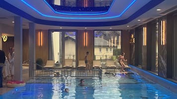 Indoor pool, open noon to 8:00 PM, sun loungers, lifeguards on site