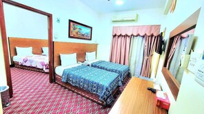 Deluxe Quadruple Room, Balcony | Desk, laptop workspace, free WiFi, wheelchair access