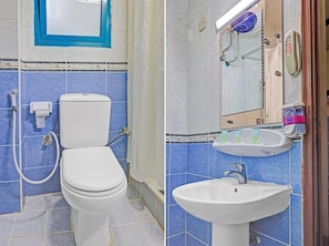 Deluxe-værelse til 3 personer | Badeværelse | Hårtørrer, håndklæder, Shampoo, Toiletpapir