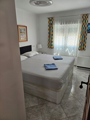 Iron/ironing board, travel crib, free WiFi, bed sheets