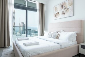 Premium bedding, memory-foam beds, in-room safe, blackout curtains