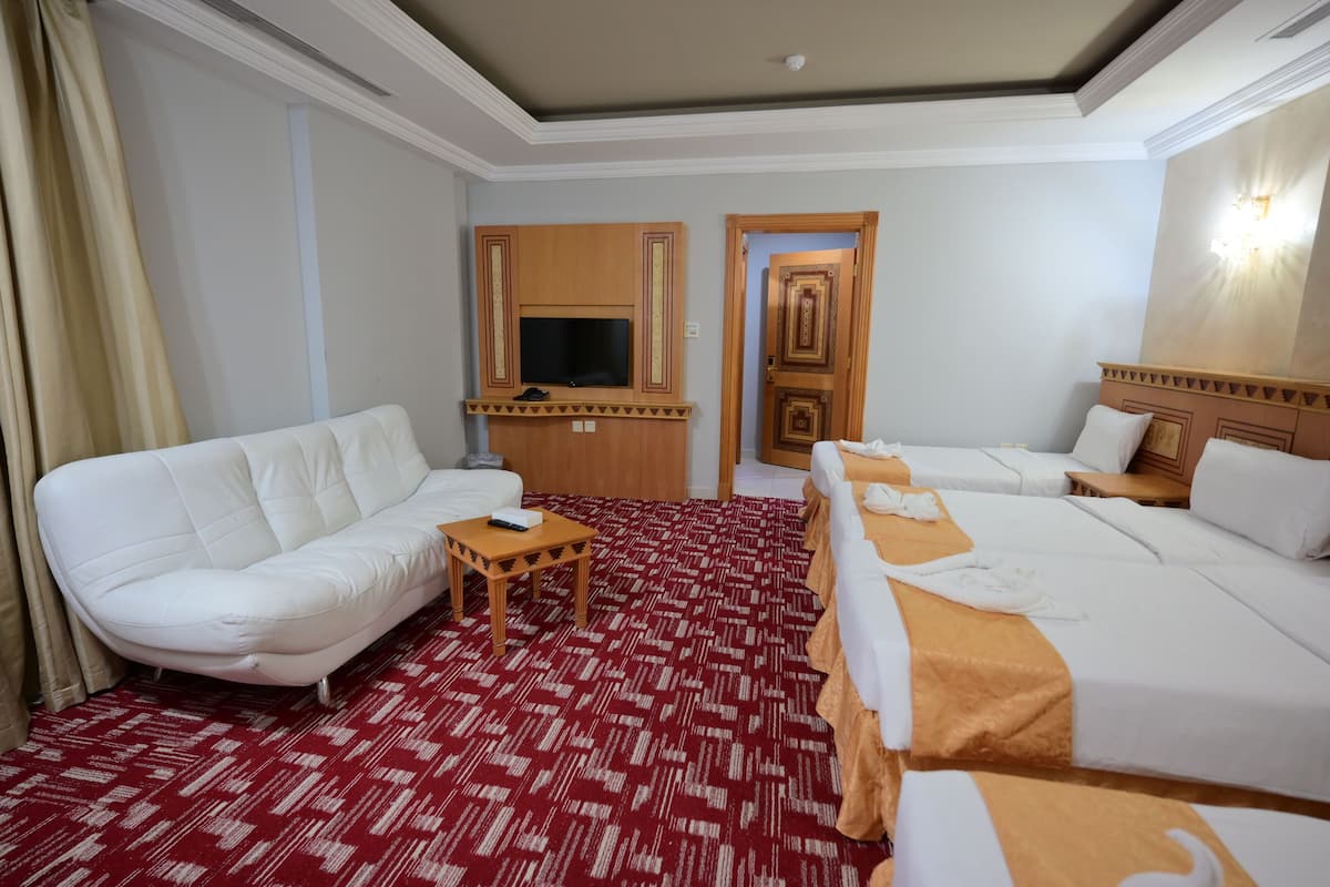 Quadruple Room | Premium bedding, in-room safe, bed sheets