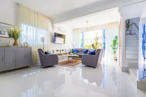 Comfort Villa, Pool View | Living area | 50-inch Smart TV with digital channels, Netflix, streaming services