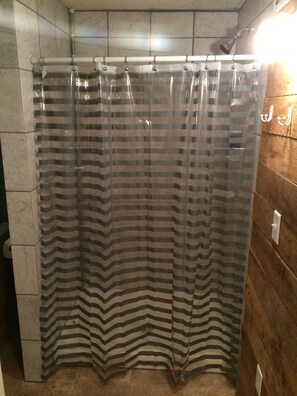 Shower, towels - 3 bedroom, 3 bath home in Matewan, WV. 1 mile from the Devil Anse trailhead. (Matewan)