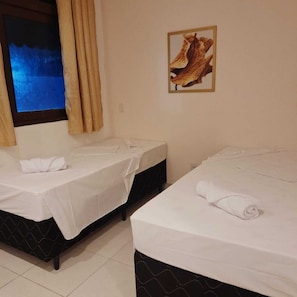 Economy Twin Room, Courtyard View | Desk, free WiFi