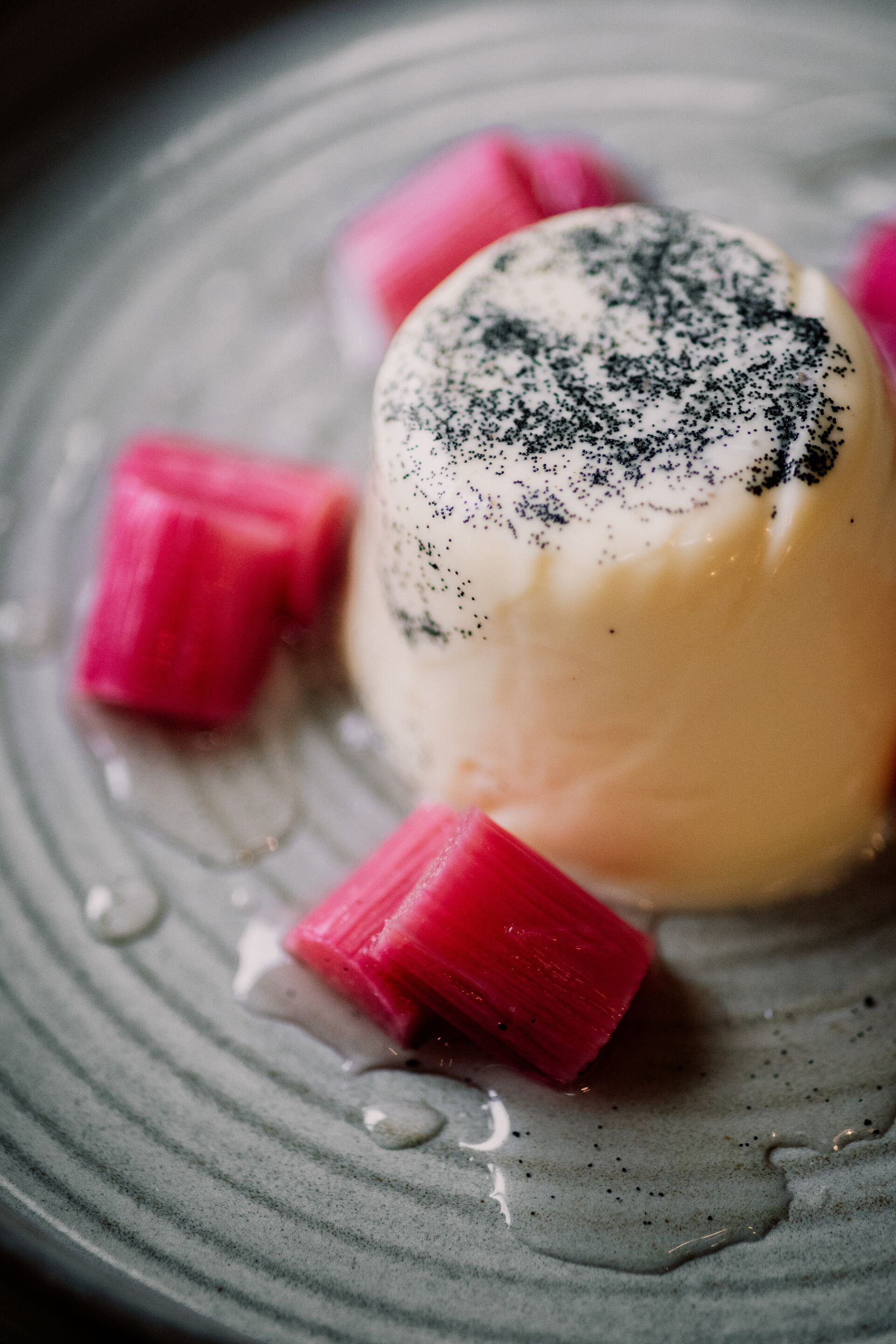 A dessert on a plate with a textured pattern.
