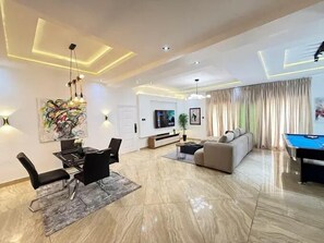 Family Apartment, Balcony, City View | Living area - Cozy Cove Residence (Abuja)