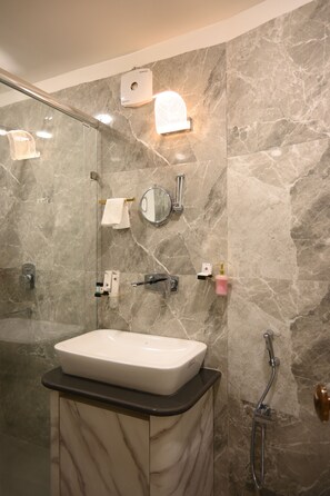 Shower, rainfall showerhead, designer toiletries, hair dryer