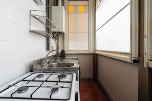 Apartment, 1 Queen Bed with Sofa bed | Private kitchen | Fridge, microwave, oven, stovetop