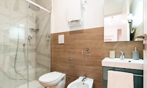 Double Room | Bathroom | Shower, hair dryer, towels, soap