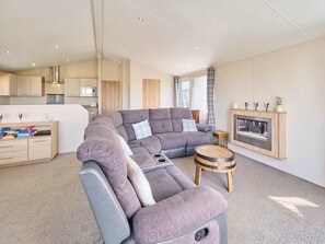 Télévision, cheminée, espaces bureaux