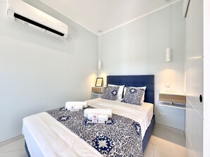 2 soveværelser, baby-/barnesenge (tillægsgebyr), sengetøj