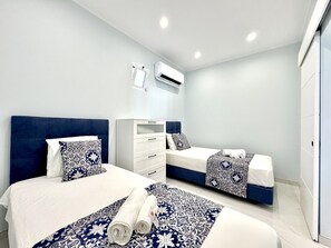 2 Schlafzimmer, Babybetten, Bettwäsche