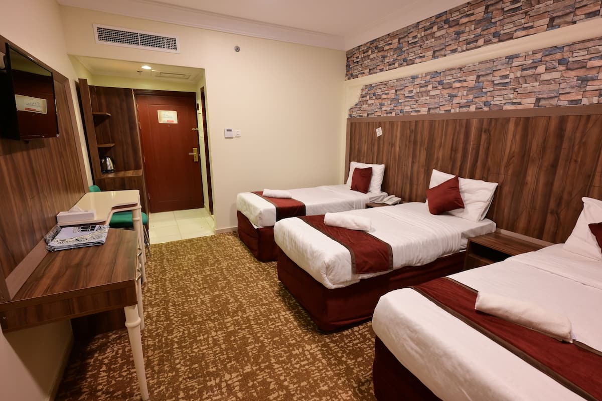 Triple Room | Premium bedding, in-room safe, bed sheets