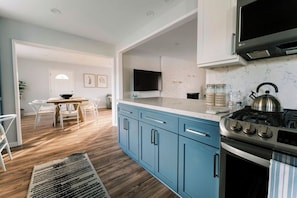 Fridge, microwave, dishwasher, coffee/tea maker