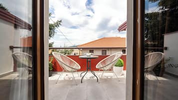 Superior studio, uitzicht op stad | Balkon