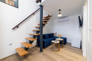 デラックス スタジオ ガーデンビュー | リビング エリア