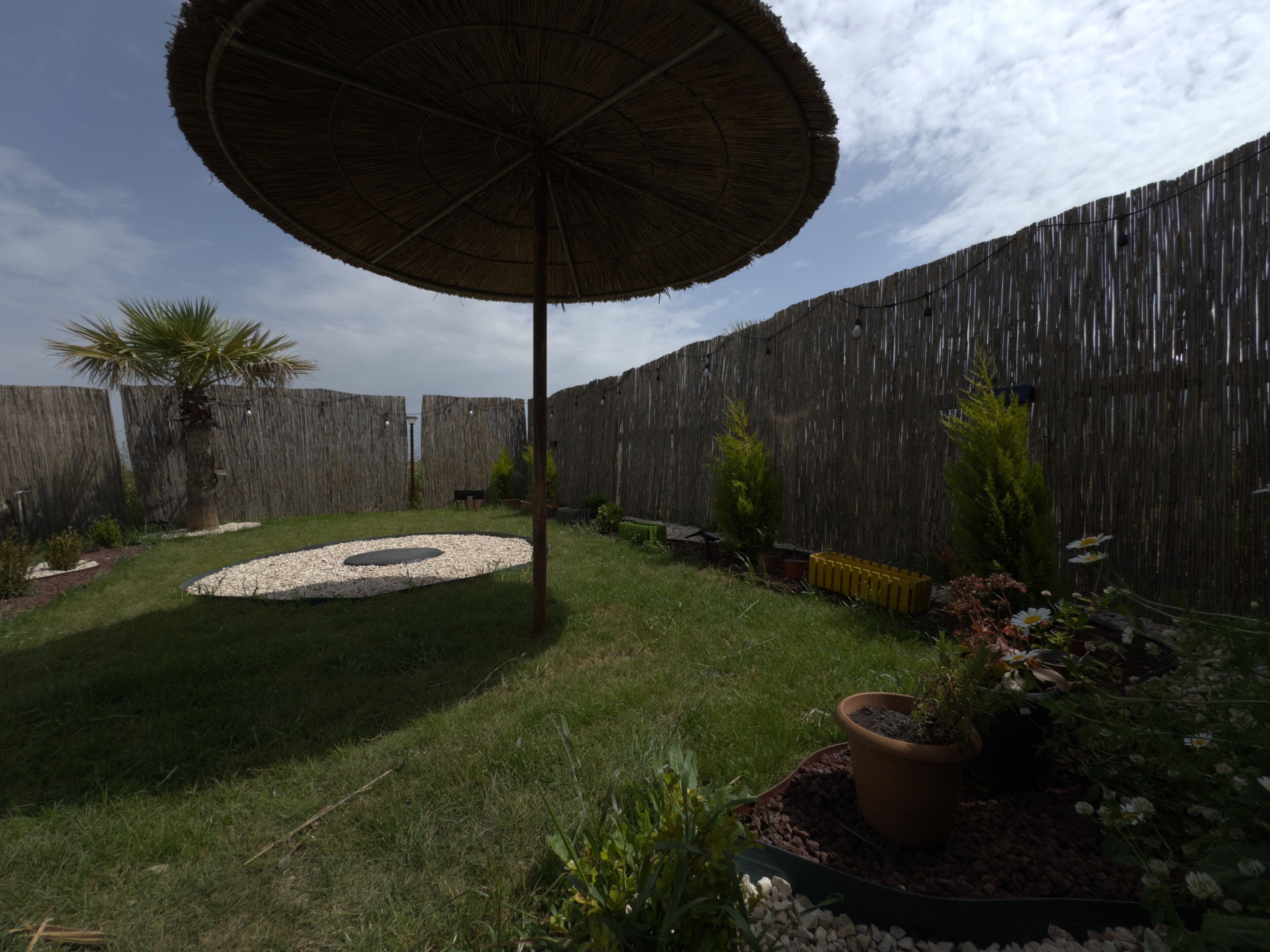 Club-bungalow - terrasse - udsigt til have | Overnatningsstedets område