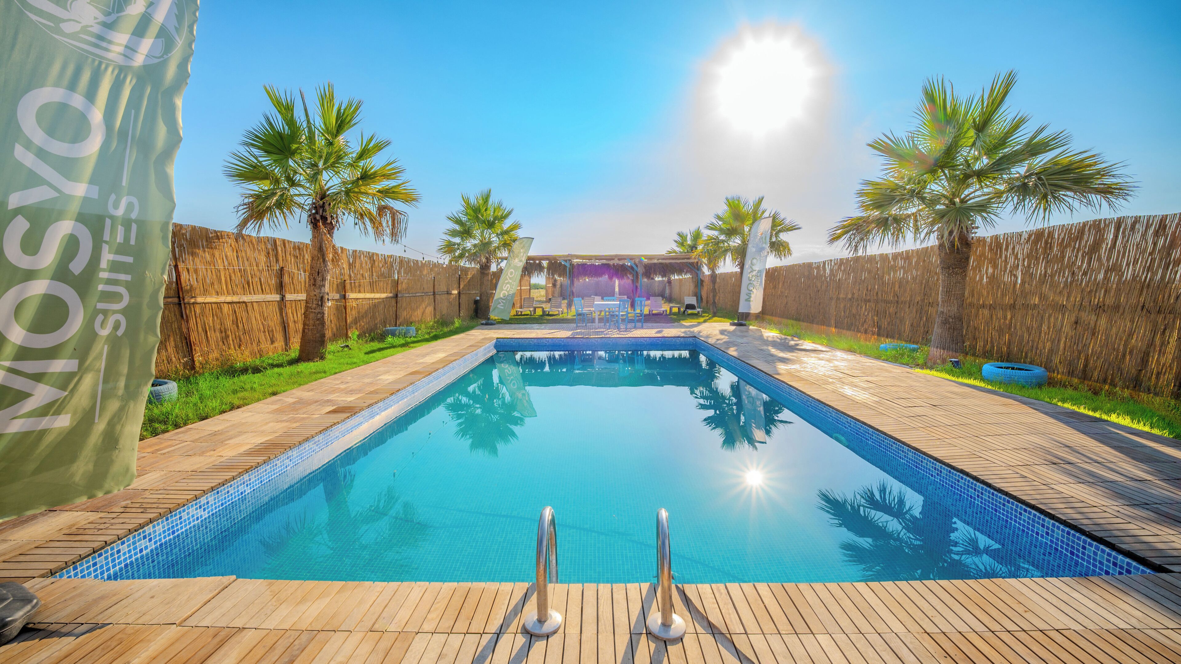 Outdoor pool, open 8:00 AM to 7:00 PM, pool umbrellas, sun loungers