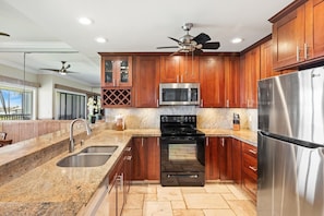 Condo, 2 Bedrooms | Private kitchen | Fridge, oven, coffee/tea maker, toaster