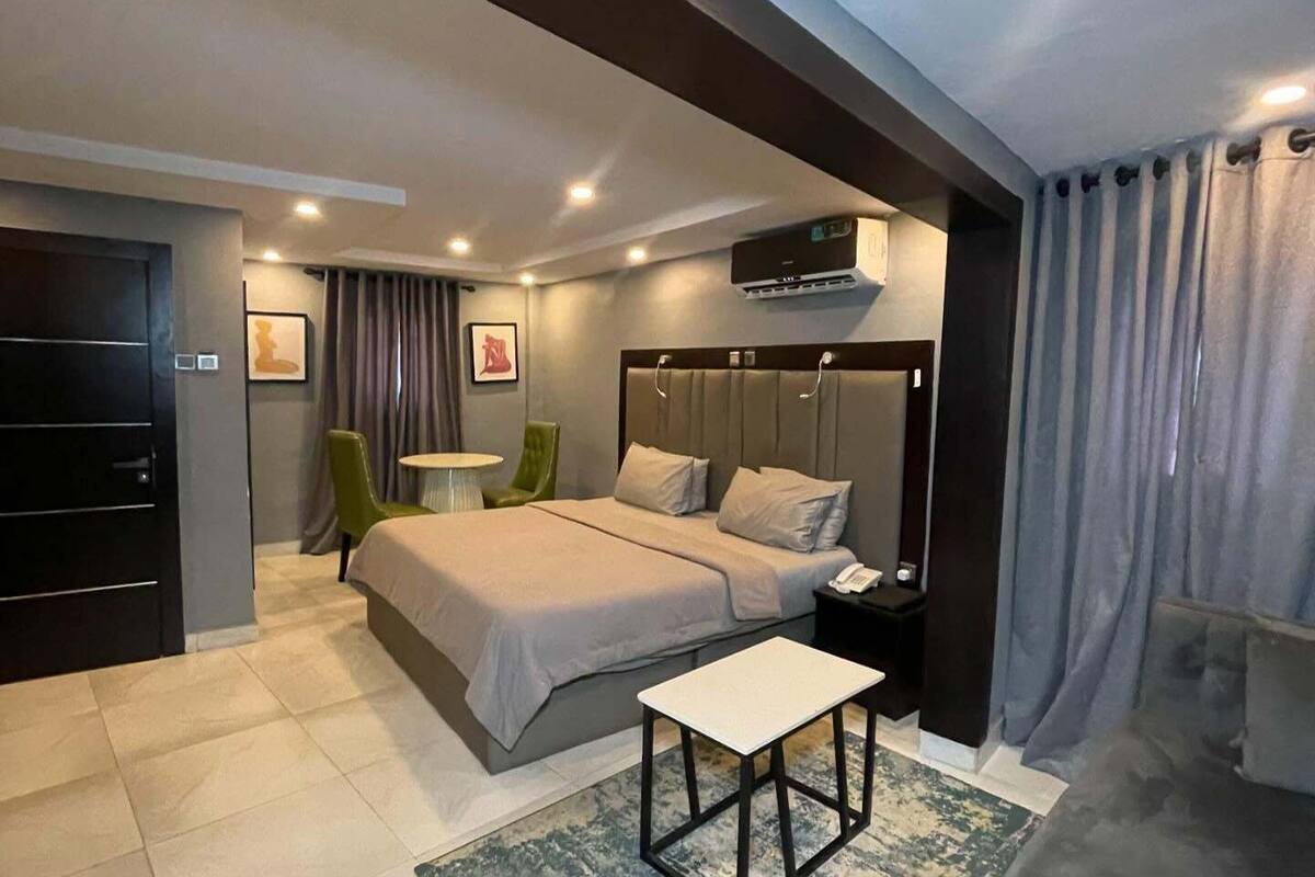 Deluxe Room, Balcony, City View | Desk, laptop workspace, blackout drapes, soundproofing