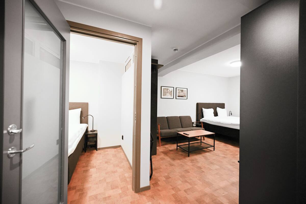 Superior Apartment | Living area | 30-inch LED TV with digital channels