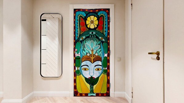 A door with a colorful, abstract design.