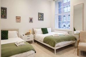 2 chambres, fer et planche à repasser, Wi-Fi, draps fournis