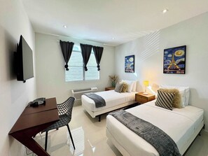 Iron/ironing board, travel crib, WiFi, bed sheets
