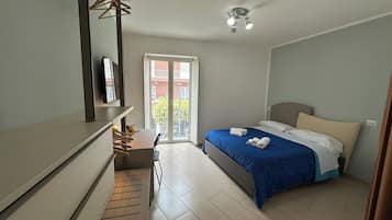 2 habitaciones, tabla de planchar con plancha, wifi y ropa de cama
