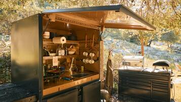 Fridge, stovetop, coffee/tea maker, cookware/dishes/utensils