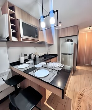 Comfort Apartment | Private kitchen | Dishwasher, cookware/dishes/utensils