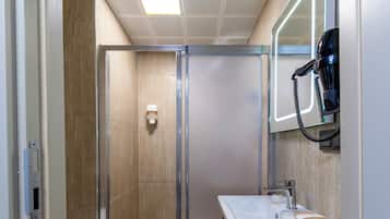 Deluxe Double Room | Bathroom | Shower, free toiletries, hair dryer, slippers