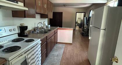 Cozy 1 bedroom apartment across from the airport with WiFi.