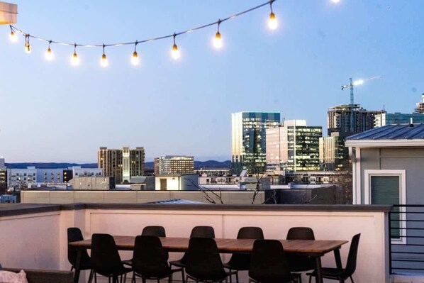 Outdoor dining - 7BR Downtown Nashville • Gulch Rooftop Deck (Nashville)