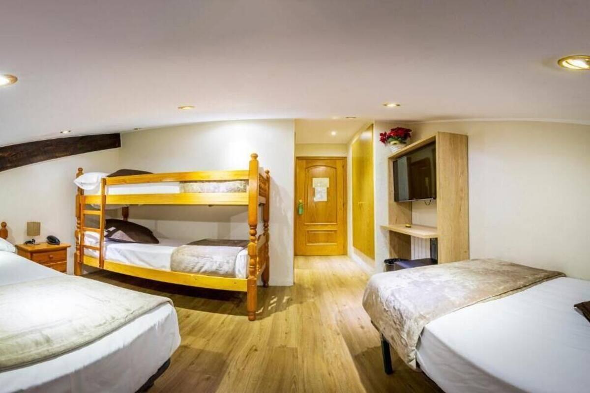 Comfort Quadruple Room, City View | Bed sheets