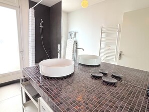 Shower, hair dryer, towels, toilet paper
